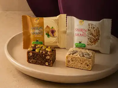 پروتئین بار شیرینشهد - انجیربار 20 گرمی محتوی مغز گردو و روکش پسته